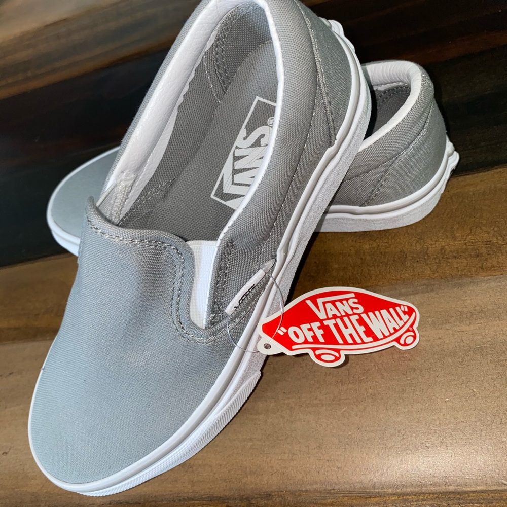 Vans size 3.5 kids size 5 in women.
